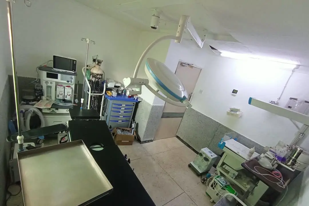 The clinic’s maternity theatre, with the operating table, overhead surgical light and anaesthesia machine